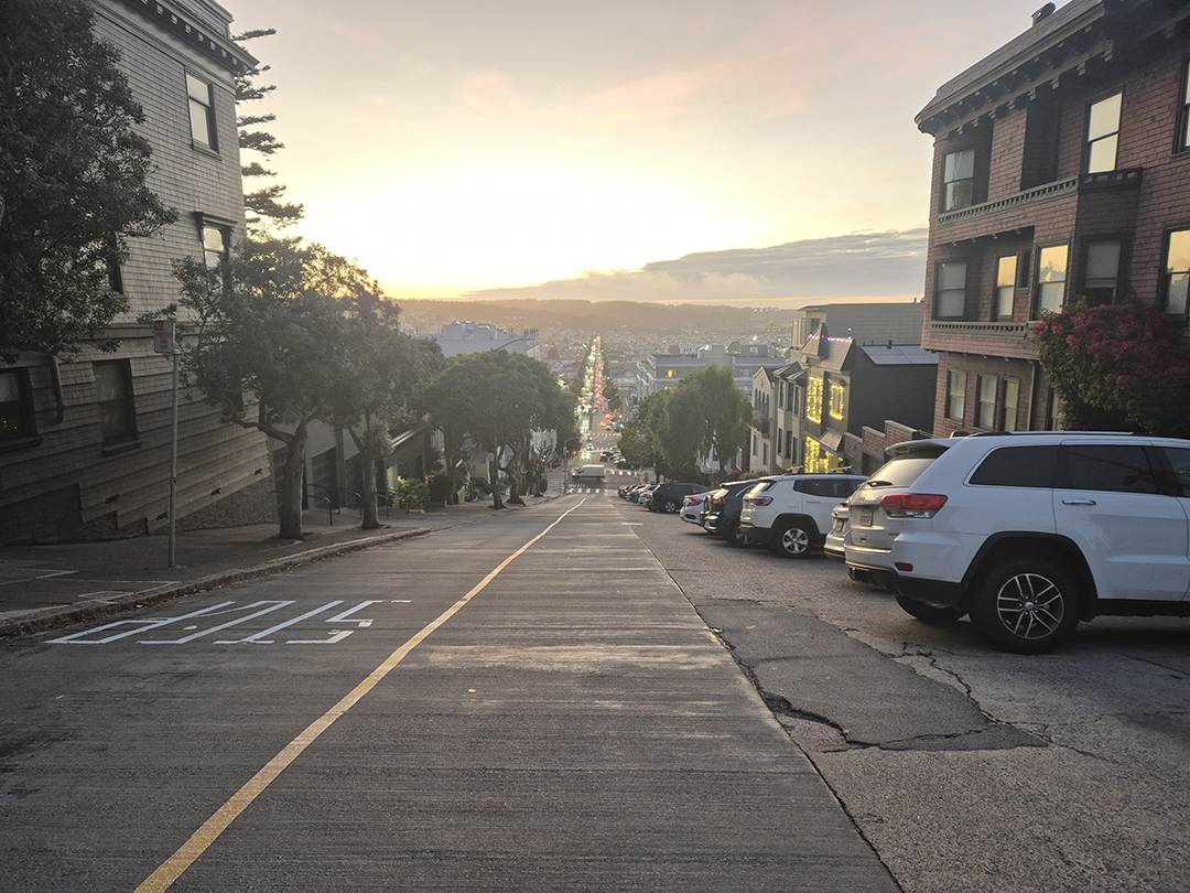 A classic steep San Francisco street, rising and falling between the city’s hills and offering sweeping views.