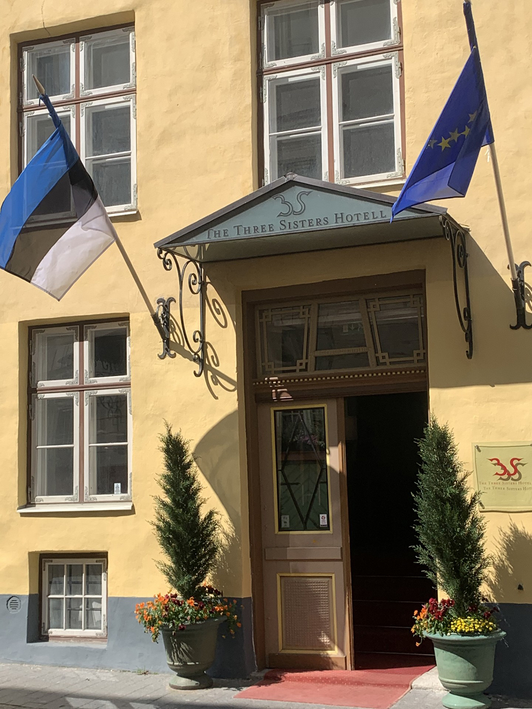 Entrance to Tallinn’s historic Three Sisters Hotel, housed in three interconnected medieval buildings.