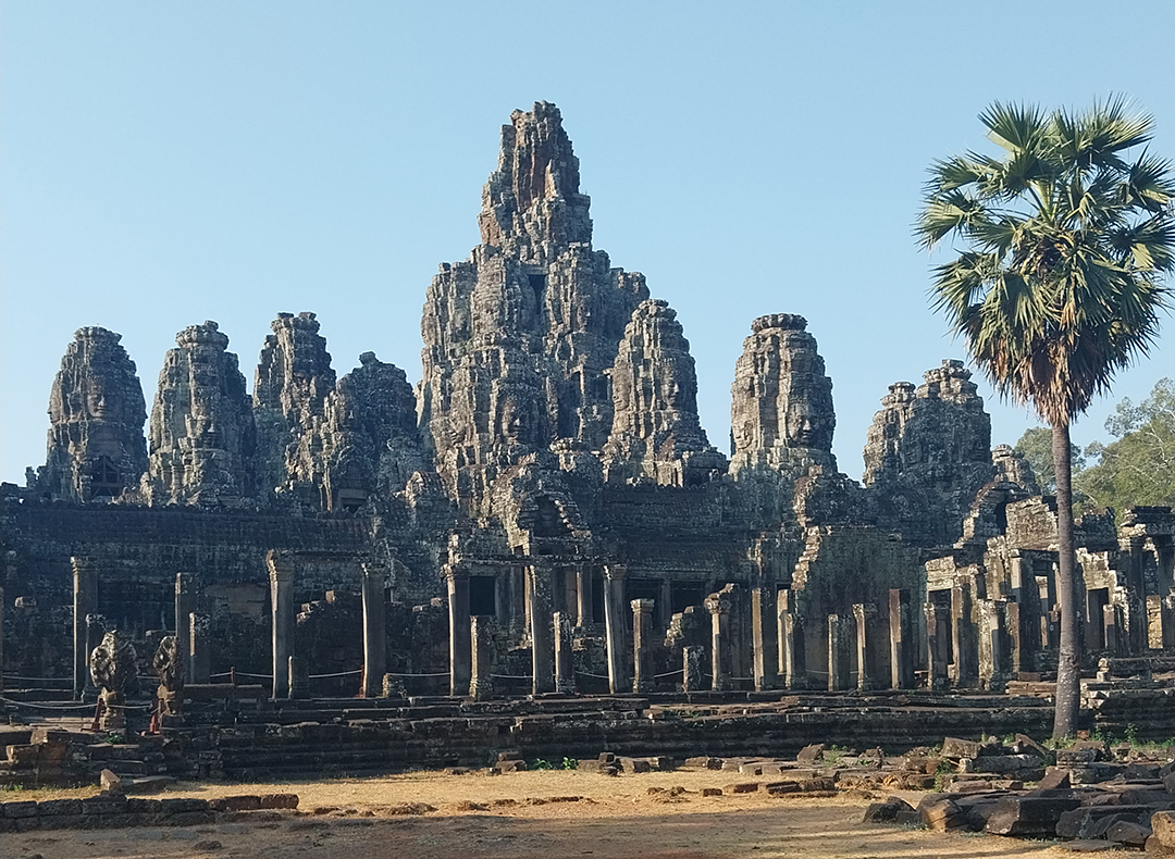 Bayon Temple in Angkor with its iconic stone faces, symbolizing Cambodia’s spiritual and architectural heritage.